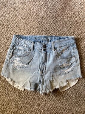 American Eagle Outfitters light blue distressed jean shorts